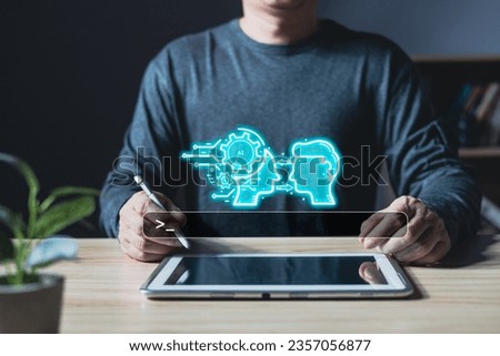 man use tablet command prompt ai chat. Big data storage.Digital Artificial Intelligence (AI) technology disruption concept. We are implementing storage technology support in the business.