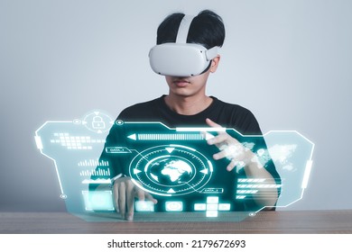 Man Use Vr Glasses And Looks At World Map Metaverse Technology, Studio Shot.Virtual Gadgets For Entertainment, Work, Free Time And Study. Game Cyber Virtual Reality Technology Concept.