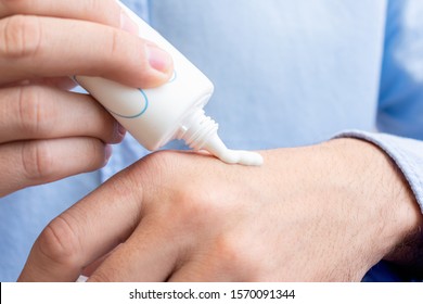 Man Uses Hand Cream, Men's Hands, Close Up, Toned