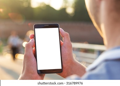 Man Uses His Mobile Phone Outdoor, Close Up