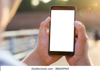Man uses his Mobile Phone outdoor, close up