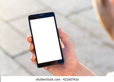 Man Uses His Mobile Phone Outdoor, Close Up