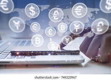 Man Uses Smart Phone, Laptop Computer, World Currencies, Bitcoin Wallet Cryptocurrency On Virtual Screen, Fintech Financial Technology, Internet Payment, Money Exchange, Digital Banking Concept