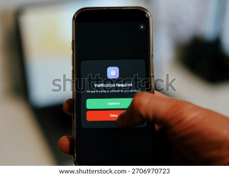 Man Uses Two Factor Authentication to Authorize Application Access Basic Enterprise Information Securtity Concept - 2FA MFA Mobile App