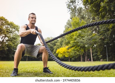 Man Using Battle Rope During Workout