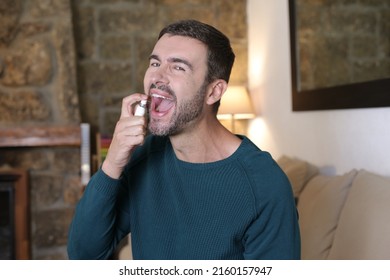 Man Using Breath Freshener Spray