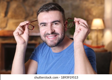 Man using clic magnetic reading glasses