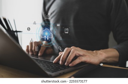 Man using cloud technology system with business information networking. Online digital data storage and connection service for download or upload via cyberspace or server