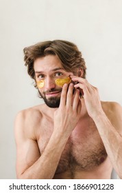 Man Using Collagen Under Eye Patch - Skincare At Home Men Beauty Routine.