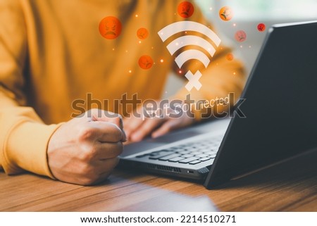 Man using a computer laptop to connect to wifi but wifi not connected, and waiting to loading digital business data form website, concept technology of waiting for connect to wifi.