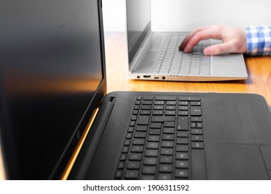 man using a computer in the office
