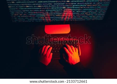 Man using computer and programming  to break code. Cyber security threat. Internet and network security. Stealing private information. Person using technology to steal password and private data. Cyber