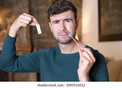 Man using coronavirus testing kit