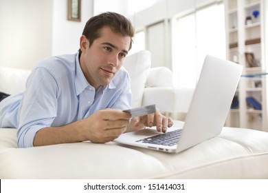 Man Using Credit Card And Laptop, Shopping On Line.indoor