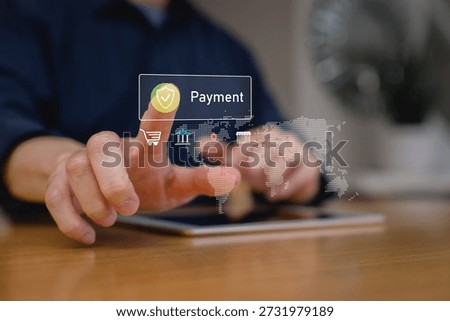 Man using digital tablet to make secure online payment with virtual global network and shopping icons. Concept of digital finance, e-commerce transaction fintech technology.