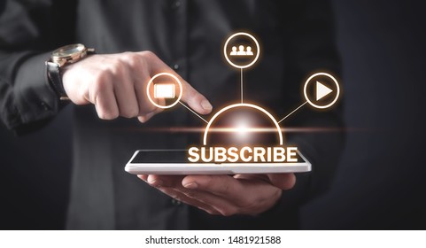 Man using digital tablet. Subscribe concept