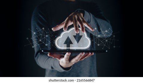 Man using digital tablet with virtual cloud computing with connection line.Cloud computing system for sharing download and upload big data information.