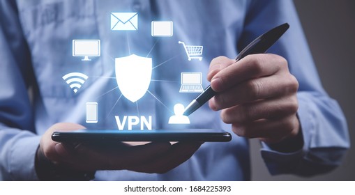 Man using digital tablet. VPN concept
