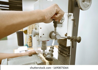 Man Using Drill Press Machine 