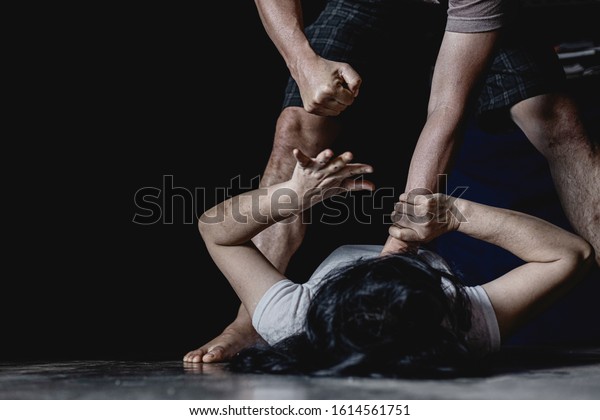 man\
are using force to coerce women. a man\'s hand is strangling a girl\
neck. stop domestic violence against women\
campaign.
