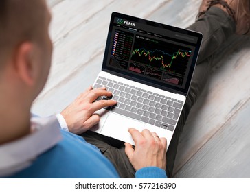 Man Using Forex Trading Software