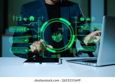 Man using futuristic interface with smart tech and mobile to manage ESG, clean energy, and sustainability data in office	