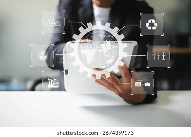 Man using futuristic interface with smart tech and mobile to manage ESG, clean energy, and sustainability data.