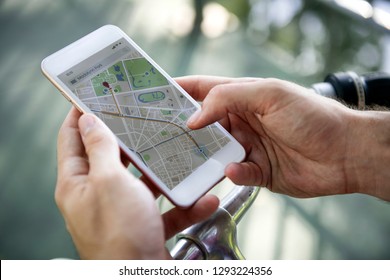Man using GPS on his phone