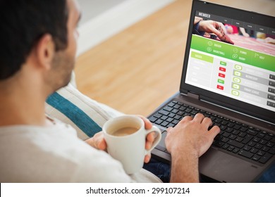 Man Using Laptop Against Gambling App Screen