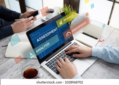 MAN USING LAPTOP AND ASSESSMENT CONCEPT