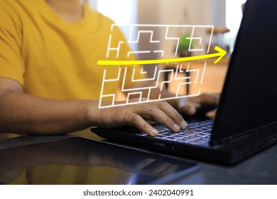 Man using laptop computer to help shorten way through the maze for easier simplify process reduce time and cost down and keep necessary indeed fast solution or accurate communication cut unnecessary