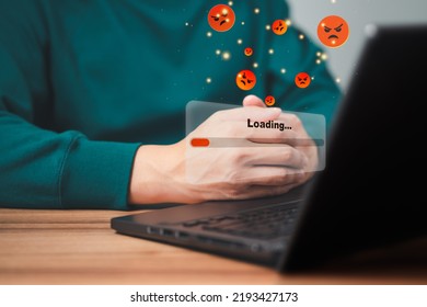 Man using laptop for download and waiting to loading digital business data form website, concept of waiting for load of loading bar.