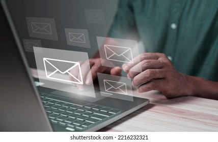 Man Using Laptop With Email Interface On Dark Background, Email Network Concept.