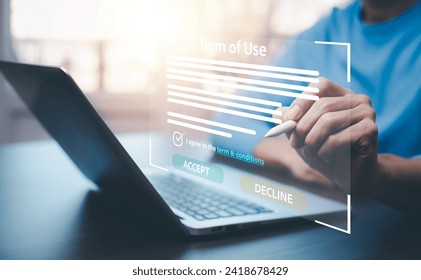 Man using a laptop with a graph of Terms of use concept, online banking check budget planning concept banner for website header design,Terms of use business concept. Terms and conditions of contract.