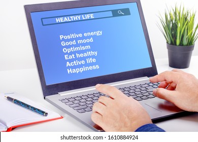 Man using laptop for makes a plan to improve your health. Healthy Life Concept.