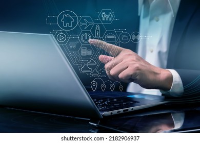Man using laptop and mobile phone with internet network technology, concept technology and work - Shutterstock ID 2182906937