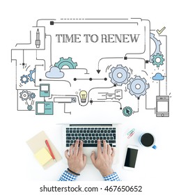 Man using laptop on workplace and TIME TO RENEW concept