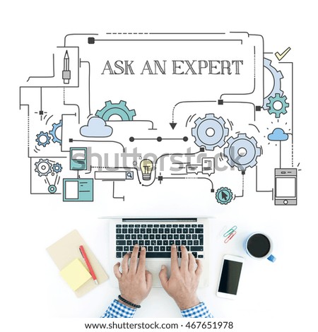Man using laptop on workplace and ASK AN EXPERT concept