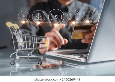 Man Using laptop to Online Shopping, e-Commerce Concept of Purchasing, Buying, price list checking and Order products on Website by credit card. - Powered by Shutterstock