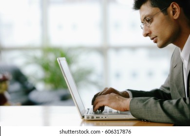 Man Using Laptop, Sideview