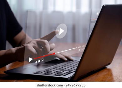 Man using laptop to stream online on virtual screen Streaming video on internet concept Watch videos on the internet, live concerts, performances or tutorials. online business content