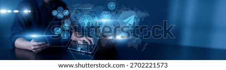 Man using laptop and tablet to analyze introductory business data. company overview metrics, growth roadmap, market positioning, brand identity, strategic development.