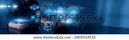 Man using laptop and tablet to analyze backup data. Cloud storage systems, disaster recovery solutions, encrypted protection, data replication, system restoration, digital continuity.
