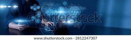 Man using laptop and tablet to analyze biotechnology data. Genetic research, medical diagnostics, pharmaceutical innovation, bioinformatics processing, healthcare solutions, lab automation.