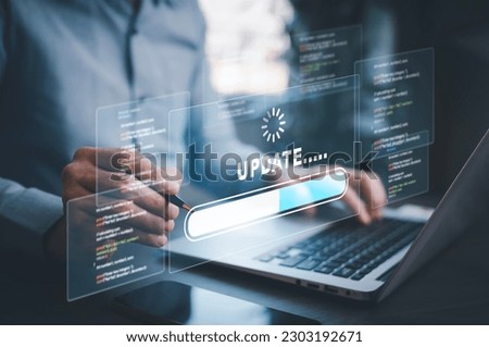 Man using laptop with Update Software Computer Program Upgrade Business Technology Internet, Update on virtual screen. Internet and technology concept, loading bar with installing the update, 