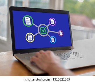 Man using a laptop with validation concept on the screen