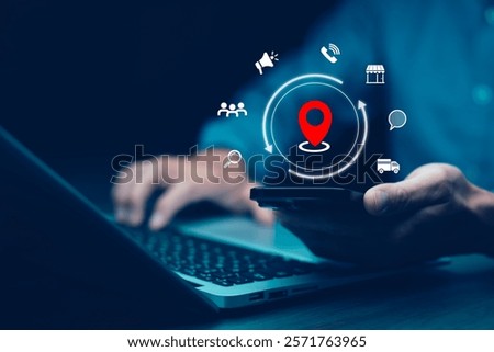Man using laptop with virtual world and model map with location point , GPS app, icon Travel maps and find places in the online system, all screen graphics are generated,Searching for travel.