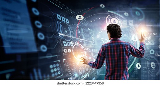 Man using media interface. Mixed media