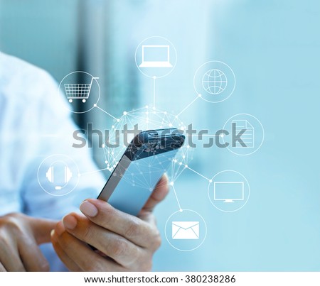 Man using mobile payments, holding circle global and icon customer network connection, Omni Channel 
