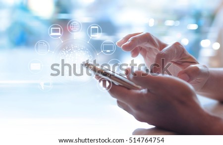 Man using mobile payments, holding circle global and icon customer network connection, Omni Channel